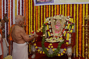 Bhajan and namaskar before HH Swamiji's portrait - GSB Seva Mandal, Mumbai